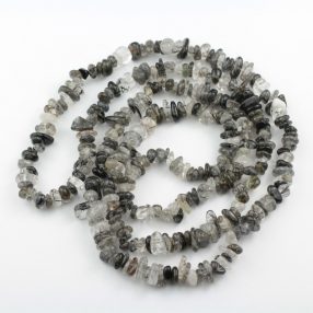   Turmalinkvarc ásvány splitter / szemcse - gömbölyített szemű - kb. 80cm-es szál