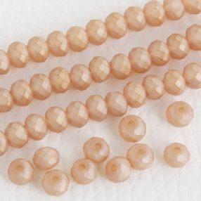   Üveg kristálygyöngy fazettált fánk kb. 4x6mm-es opálos, homokszínű, matt