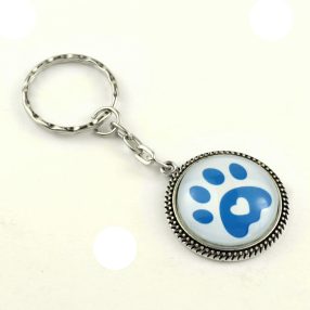 Üveglencsés kulcstartó - tappancs mancs (0201)