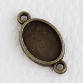   Tibeti stílusú KÉTOLDALAS ragasztható fém medál alap / összekötő elem  - antik bronz színű 23x13mm-es, 14x10mm-es kabosonhoz