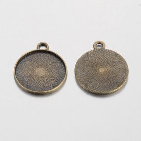   Tibeti stílusú ragasztható fém medál alap - antik bronz színű 28x24mm-es, 22mm-es kabosonhoz